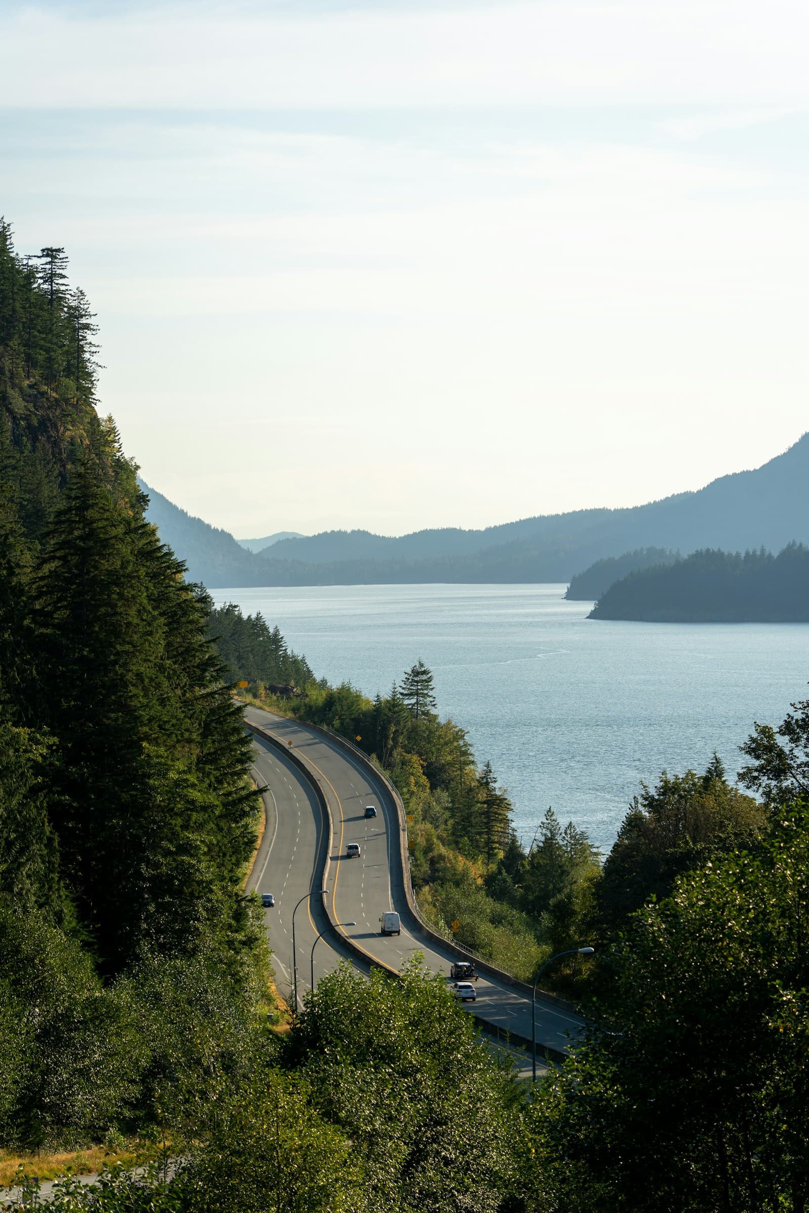 Sea to Sky Highway in British Columbia with traffic beside the coast